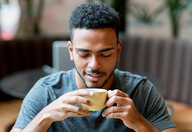 man drinking coffee